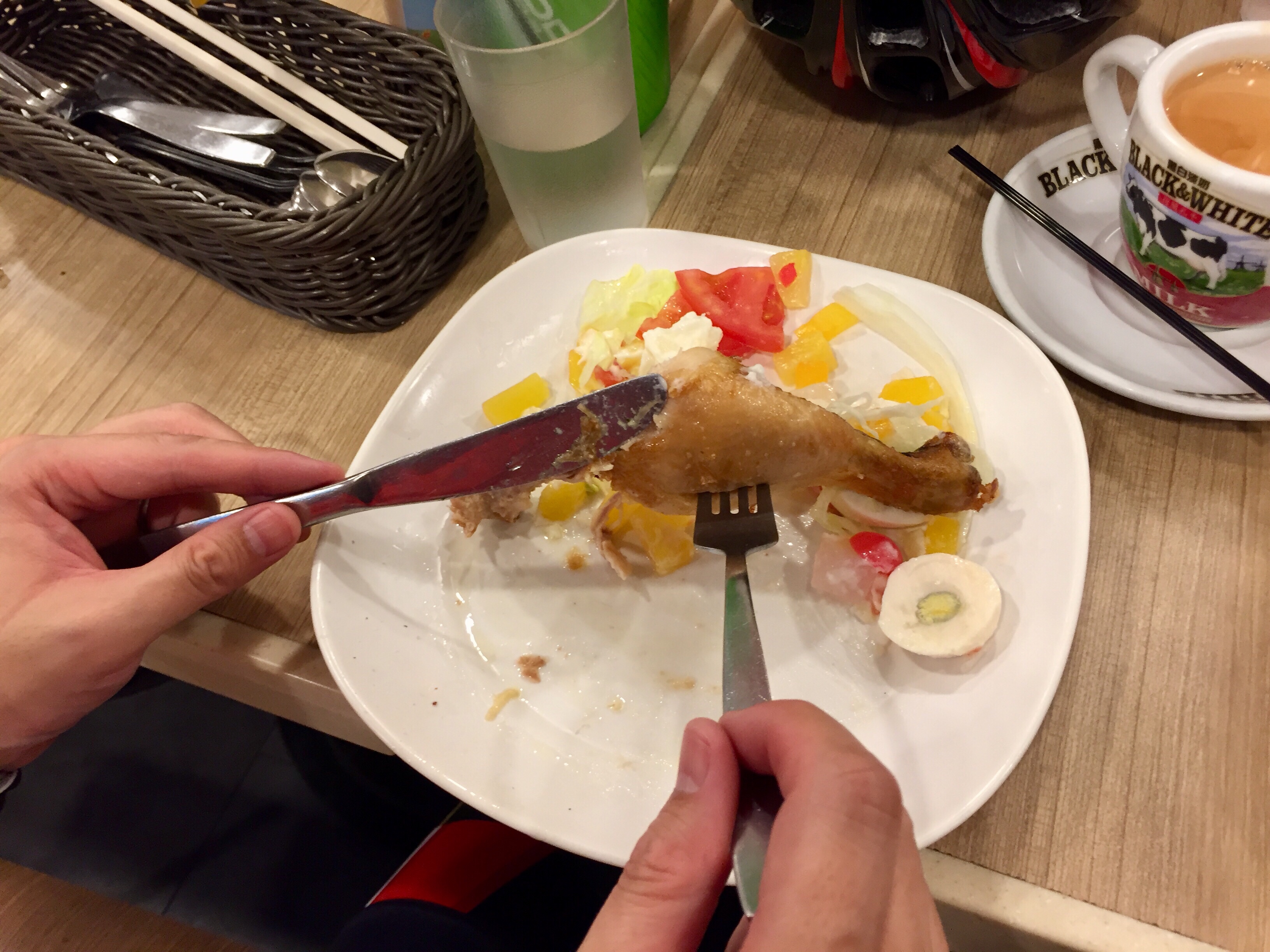 Chicken Leg served with salad with tea
