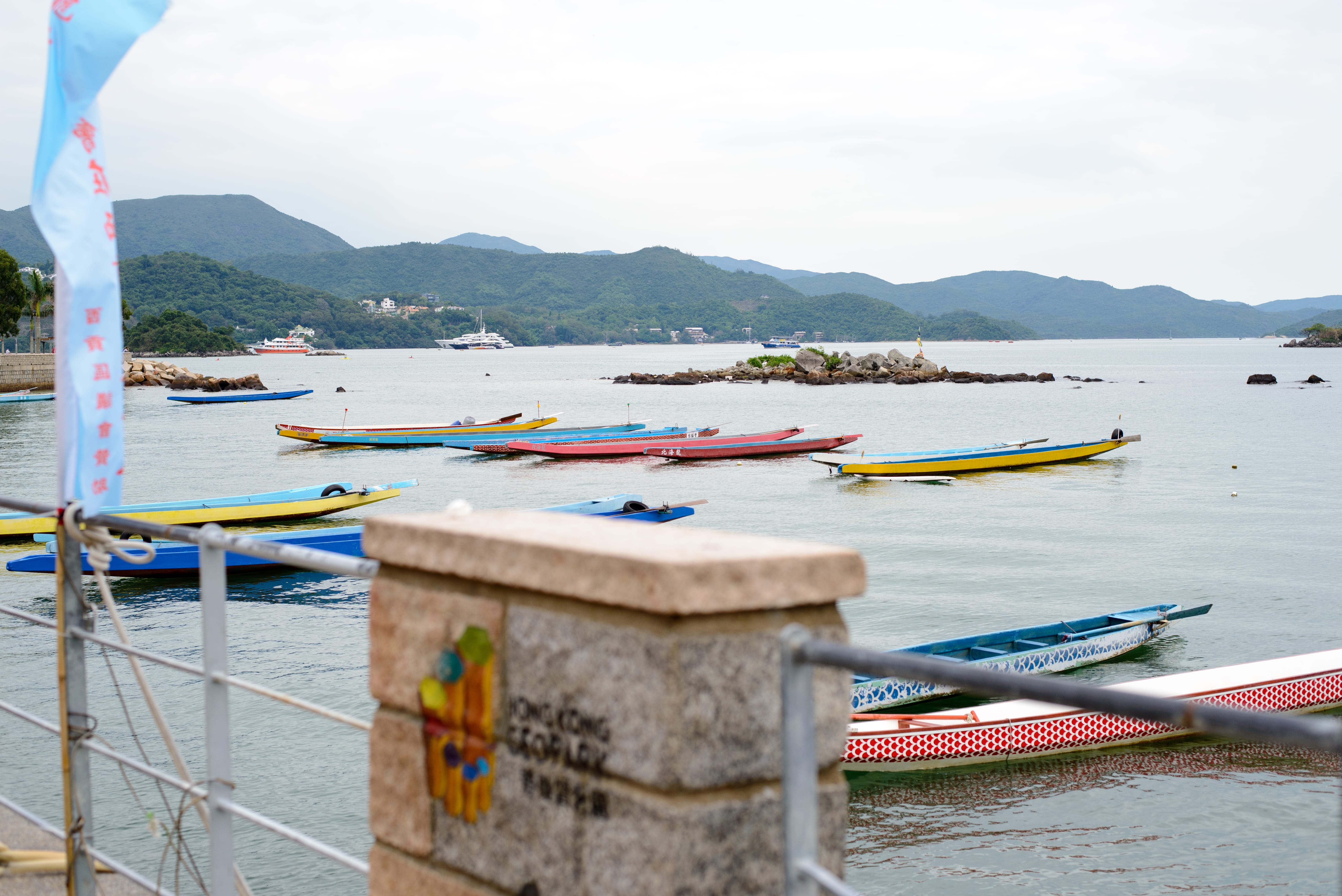 Dragon Boats parked next to the ferry pier