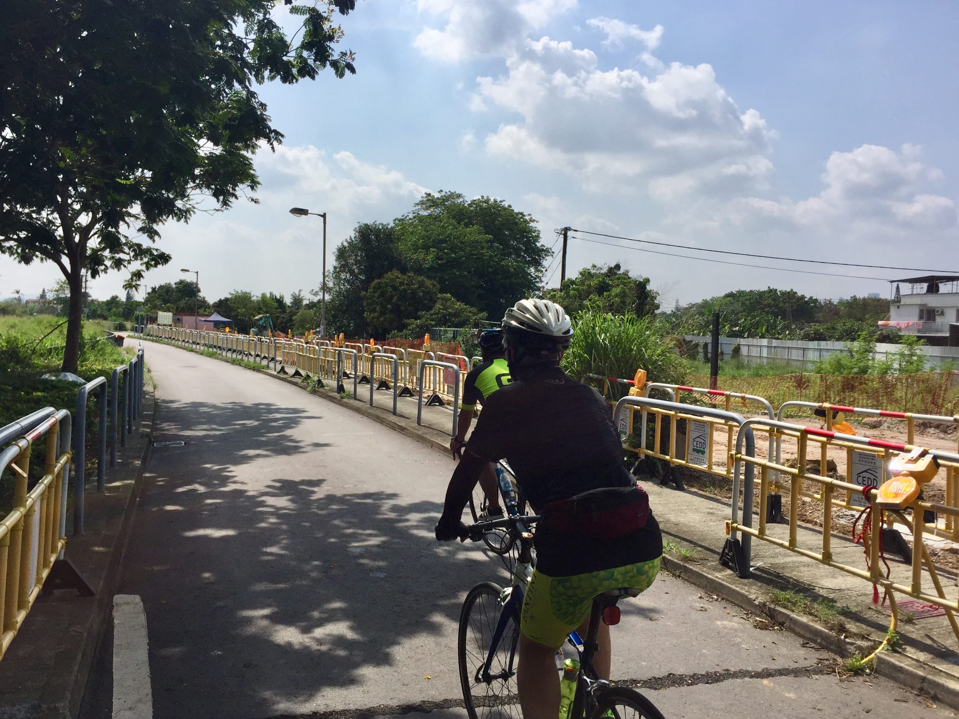 Riding along Yau Pok Road to today's destination