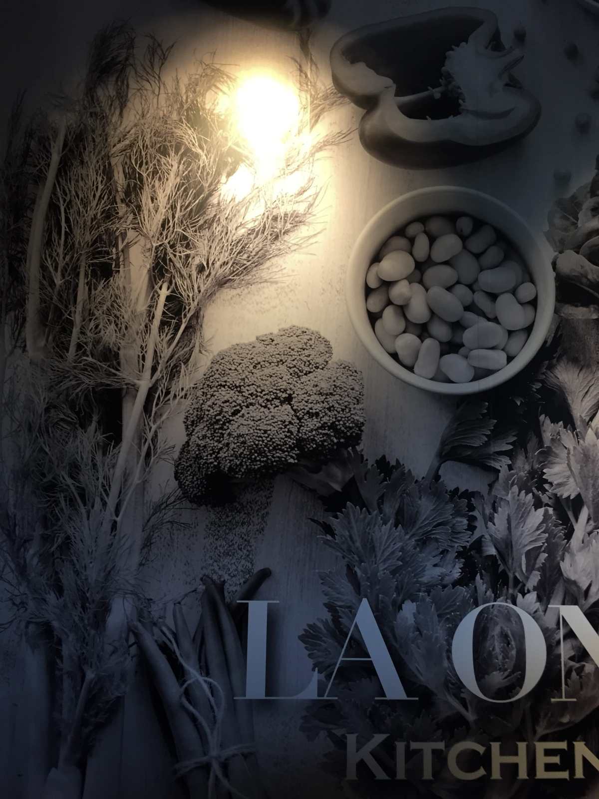 Huge painting of vegtables at the staircase to the restaurant