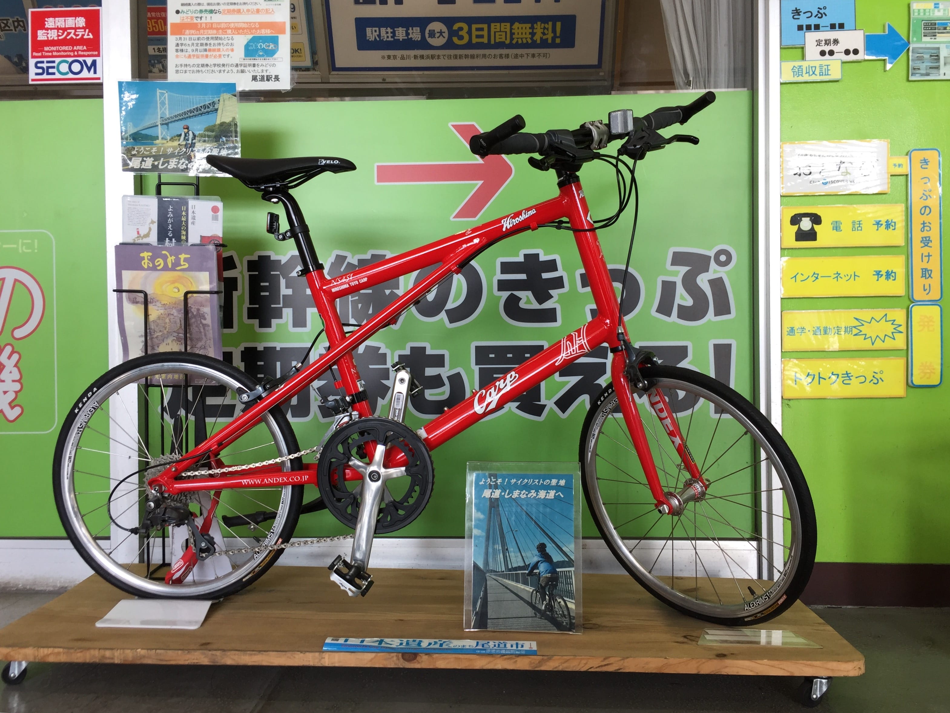 Small wheel road bike shown in a demonstration booth at Onomichi Station