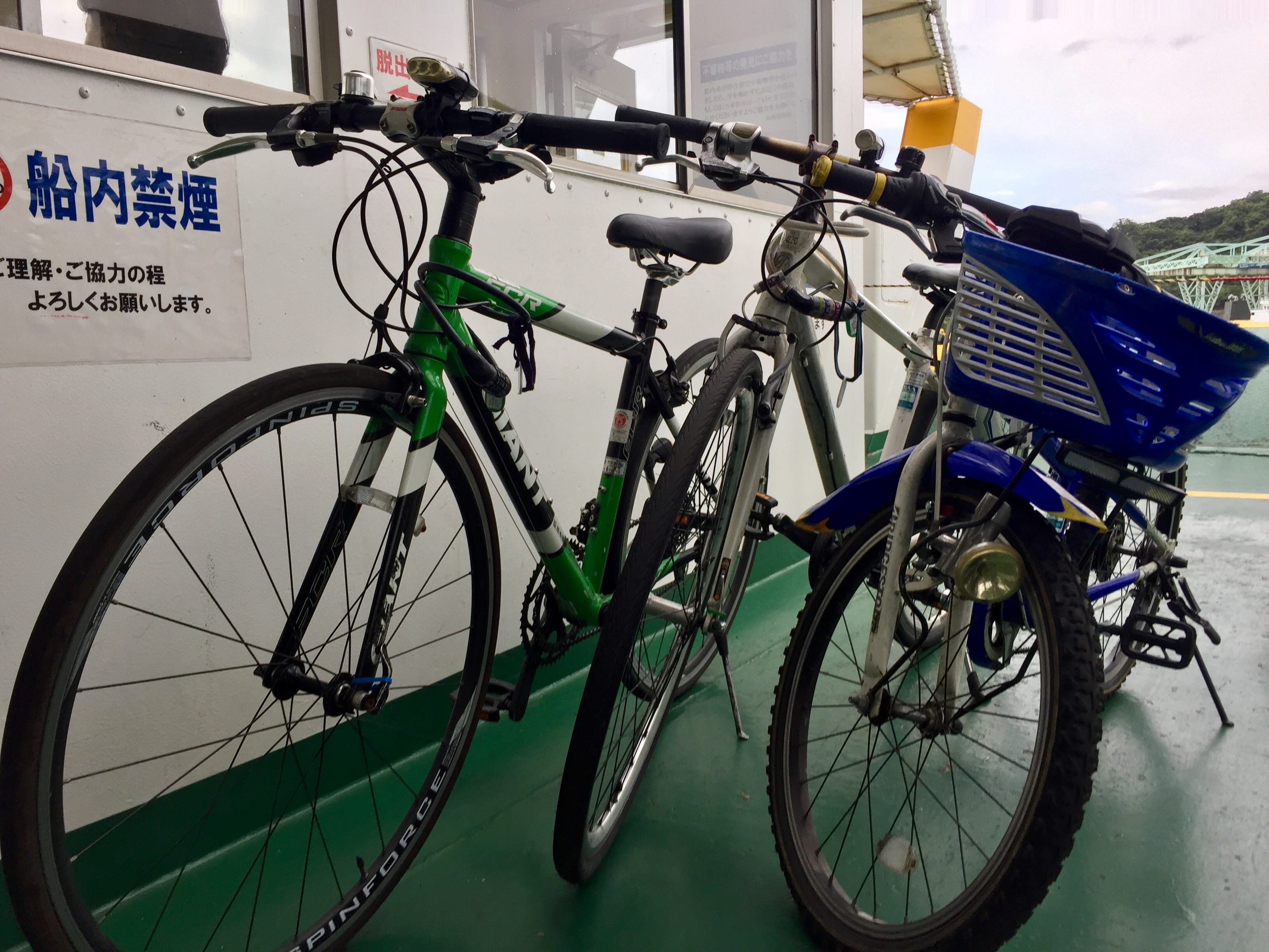 Two flat-bar road bikes plus the kid bike for my boy