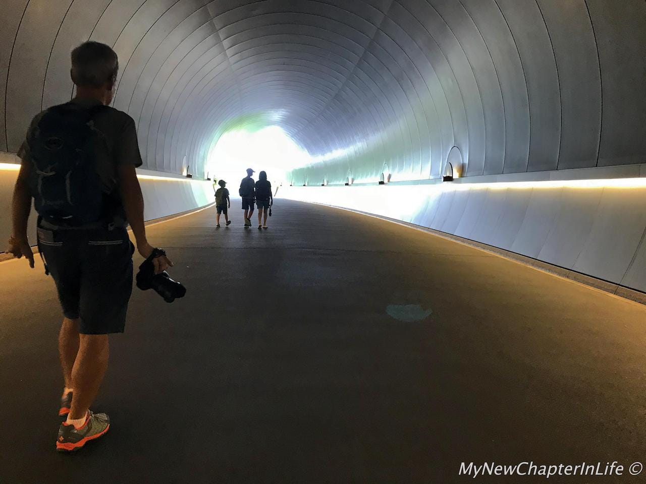 Strolling along the metallic tunnel and prepare for the scenery ahead